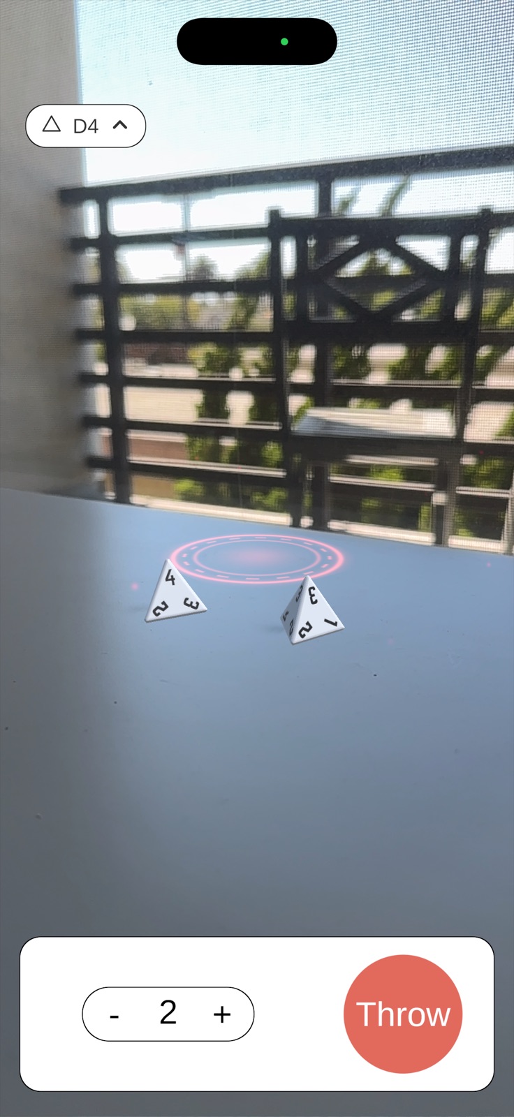 Two D4 tetrahedral dice on a balcony table in AR