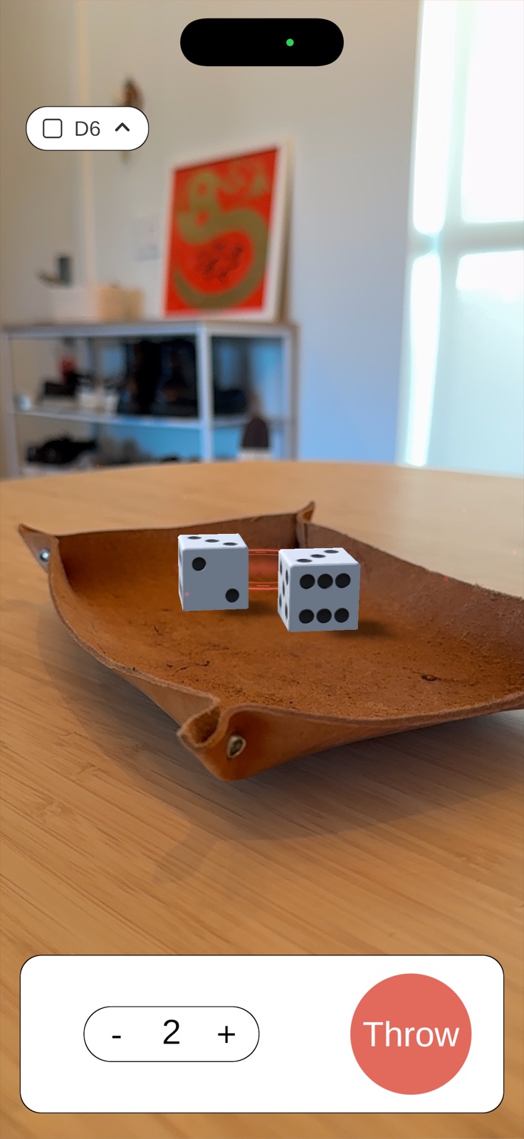 Two D6 dice in a leather dice tray in AR
